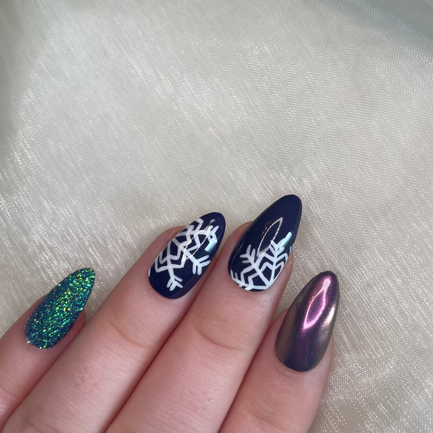 Navy Snowflake Chrome and Glitter Almond Nails