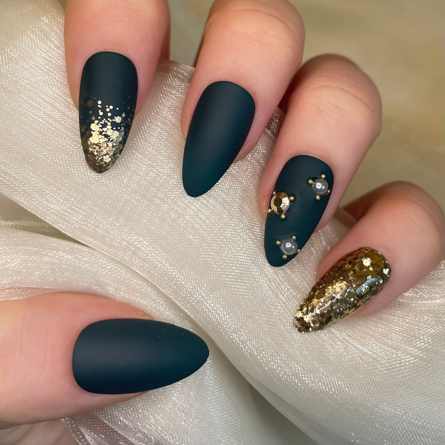 Deep Green and Gold Glitter Almond Nails