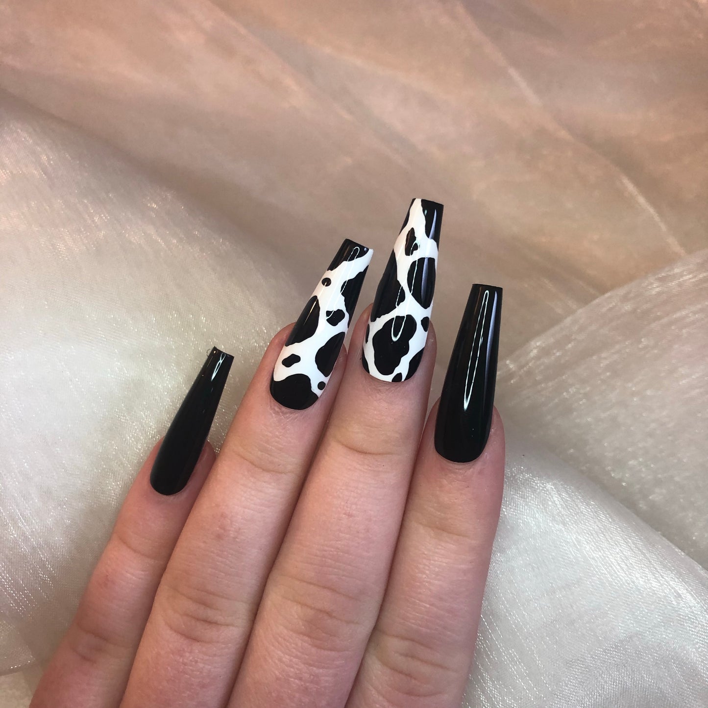 Cow Print and Black Ballerina Nails