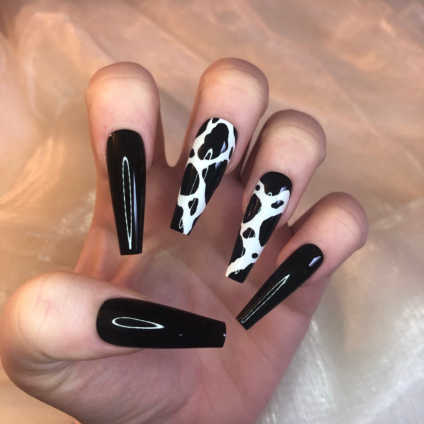 Cow Print and Black Ballerina Nails