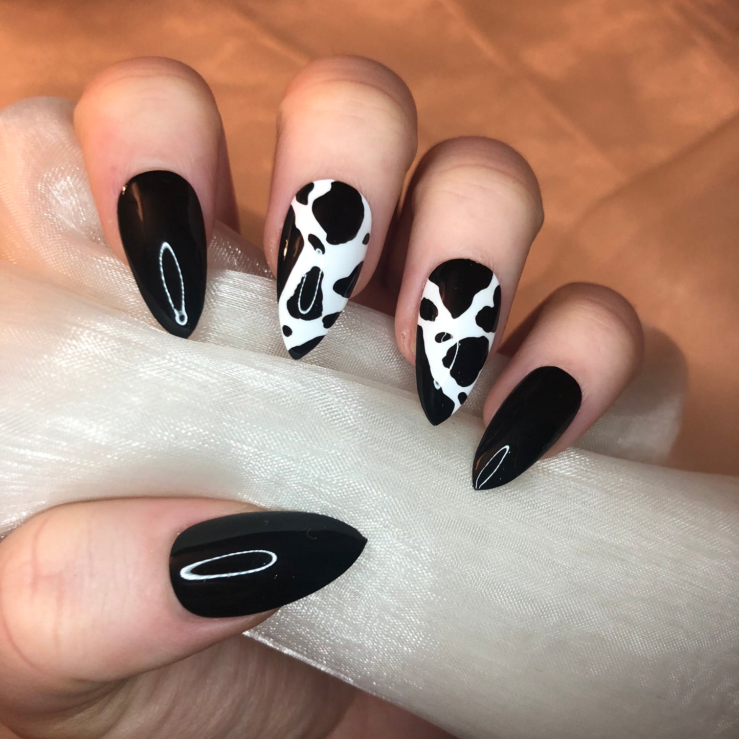 Cow Print and Black Ballerina Nails