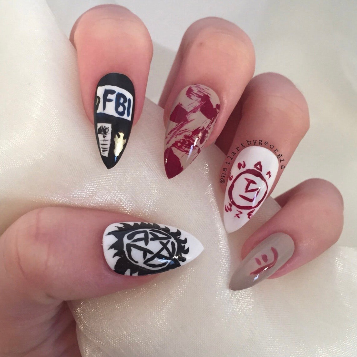 Supernatural themed stiletto nails