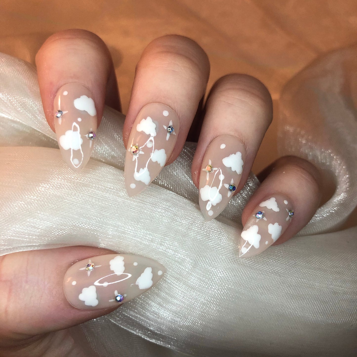 Sheer Nude Cloud Stiletto Nails