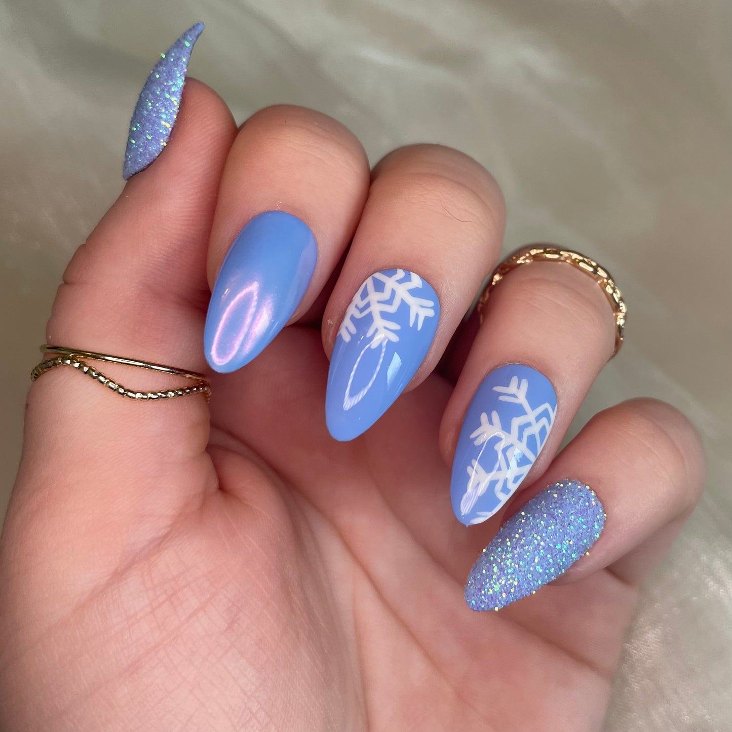 Baby Blue Snowflake Chrome and Glitter Almond Nails