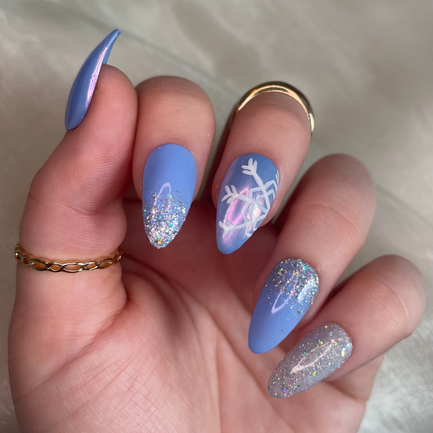 Baby Blue Snowflake Almond Nails with Glitter Ombré and Chrome Design