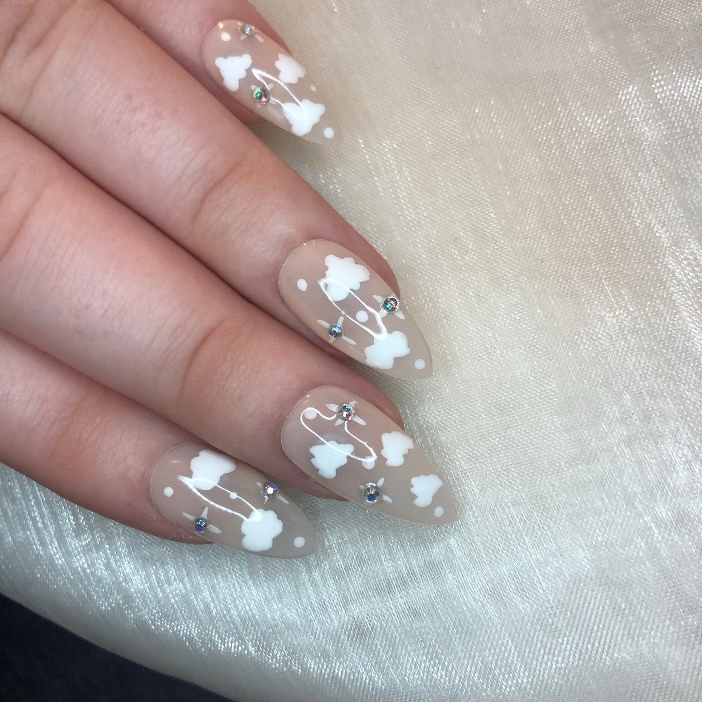 Sheer Nude Cloud Stiletto Nails