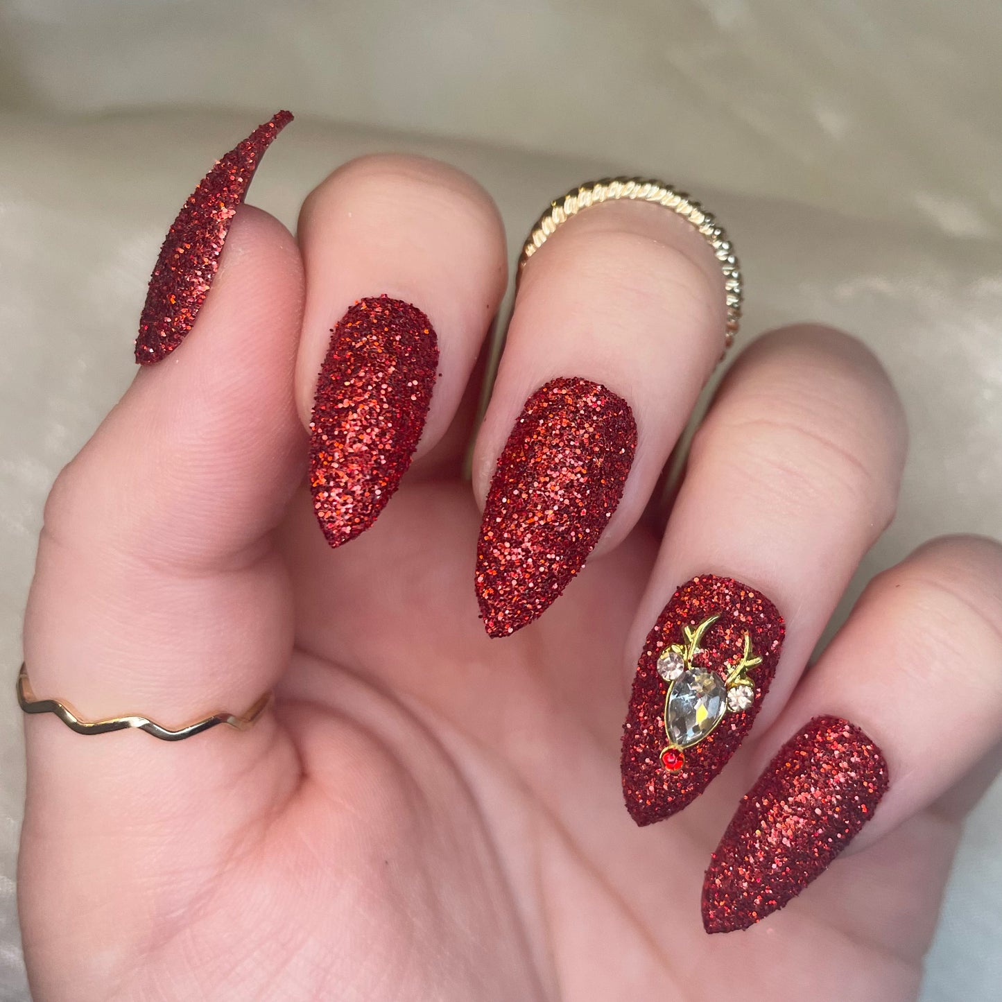 Red Glitter Stiletto Nails with Reindeer Charm